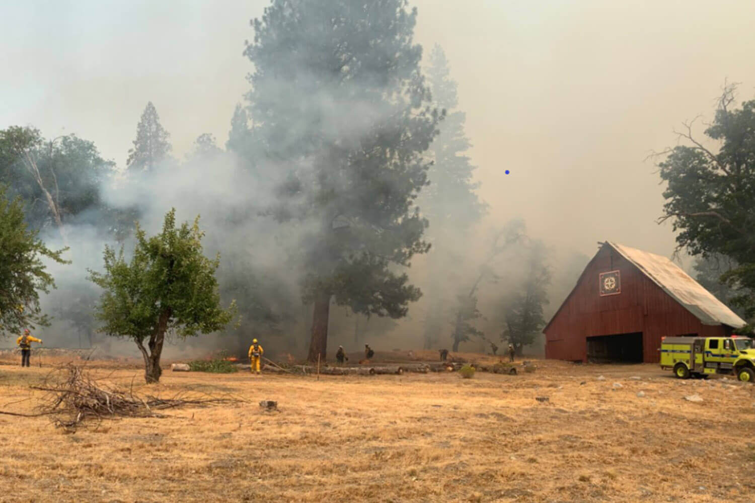 firefighters fighting fire at heart k ranch