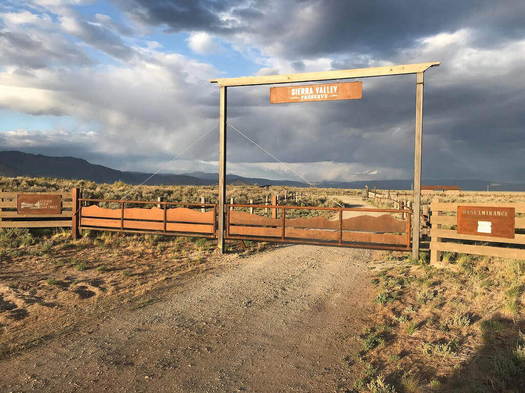 The ranch-style gate at the West Entrance of the Sierra Valley Preserve