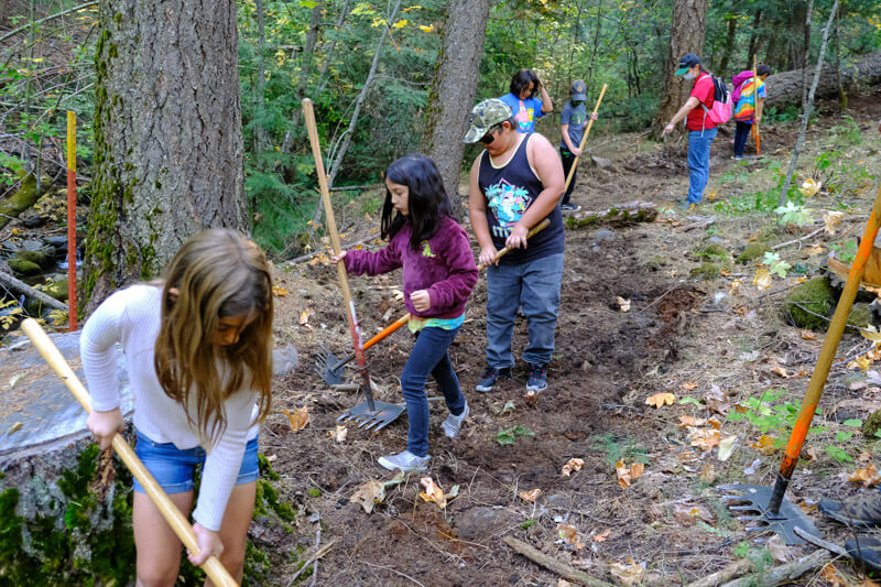 Group of students clear trail in Boyle's Ravine in Quincy